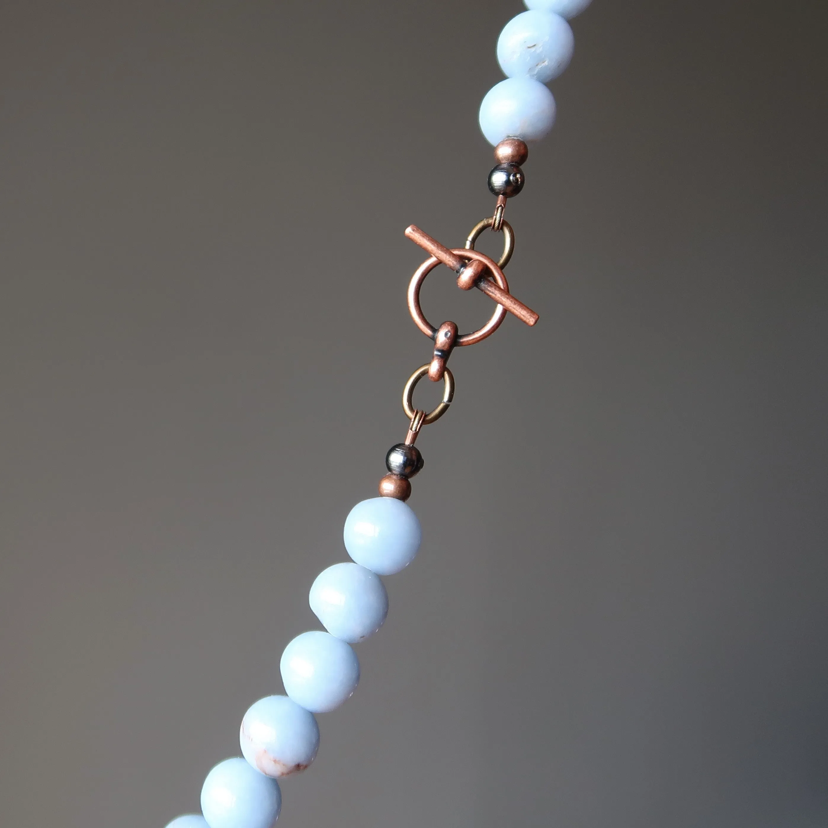 Angelite Necklace Hug of Angels Antiqued Round Blue Gems