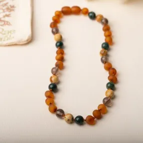 Baltic Amber Teething & Pain Jewelry in 'River'