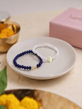 Blue & White Pearl Charm Bracelet Rakhi Set (Set of 2)