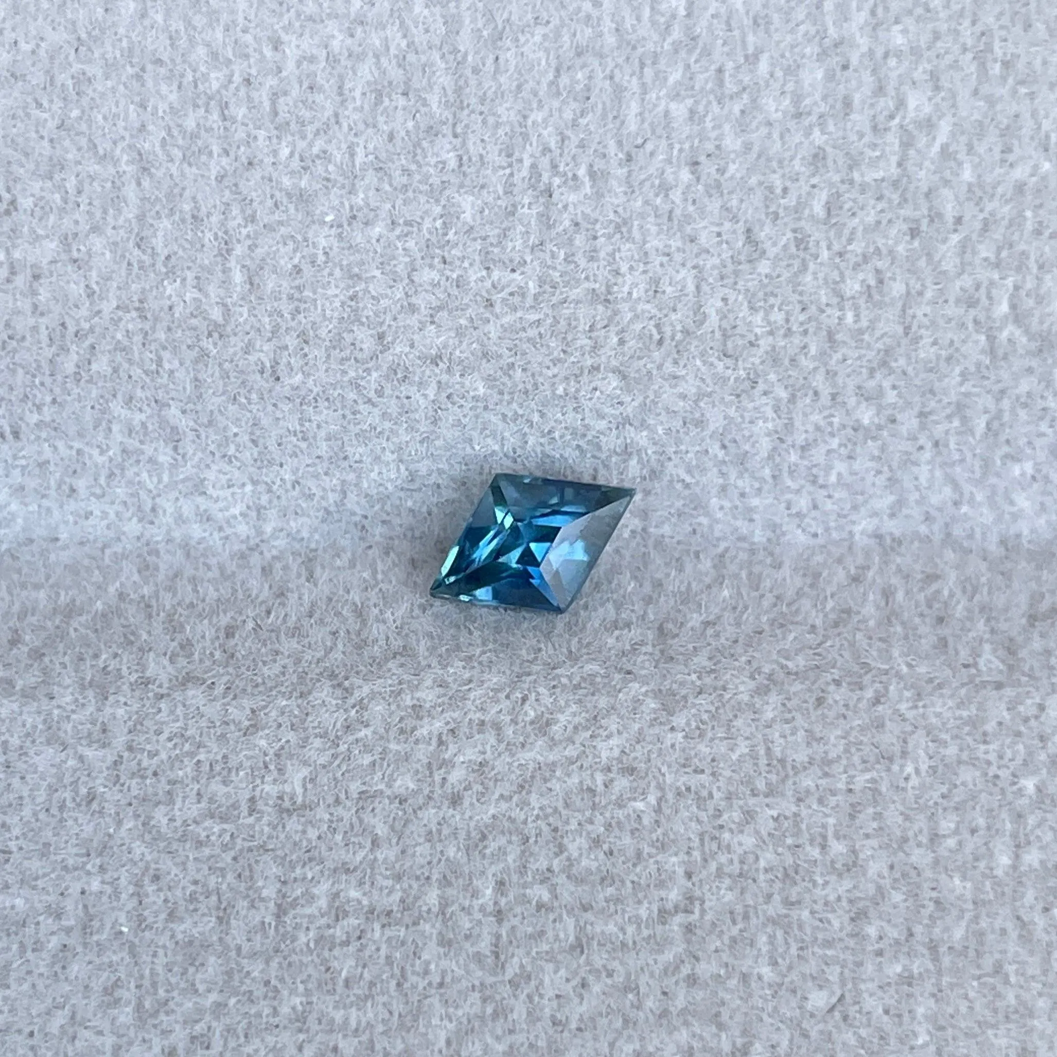 Certified heated Teal Blue kite Cut Sapphire 0.45 Carats 4.00 x 6.10 x 3.30mm