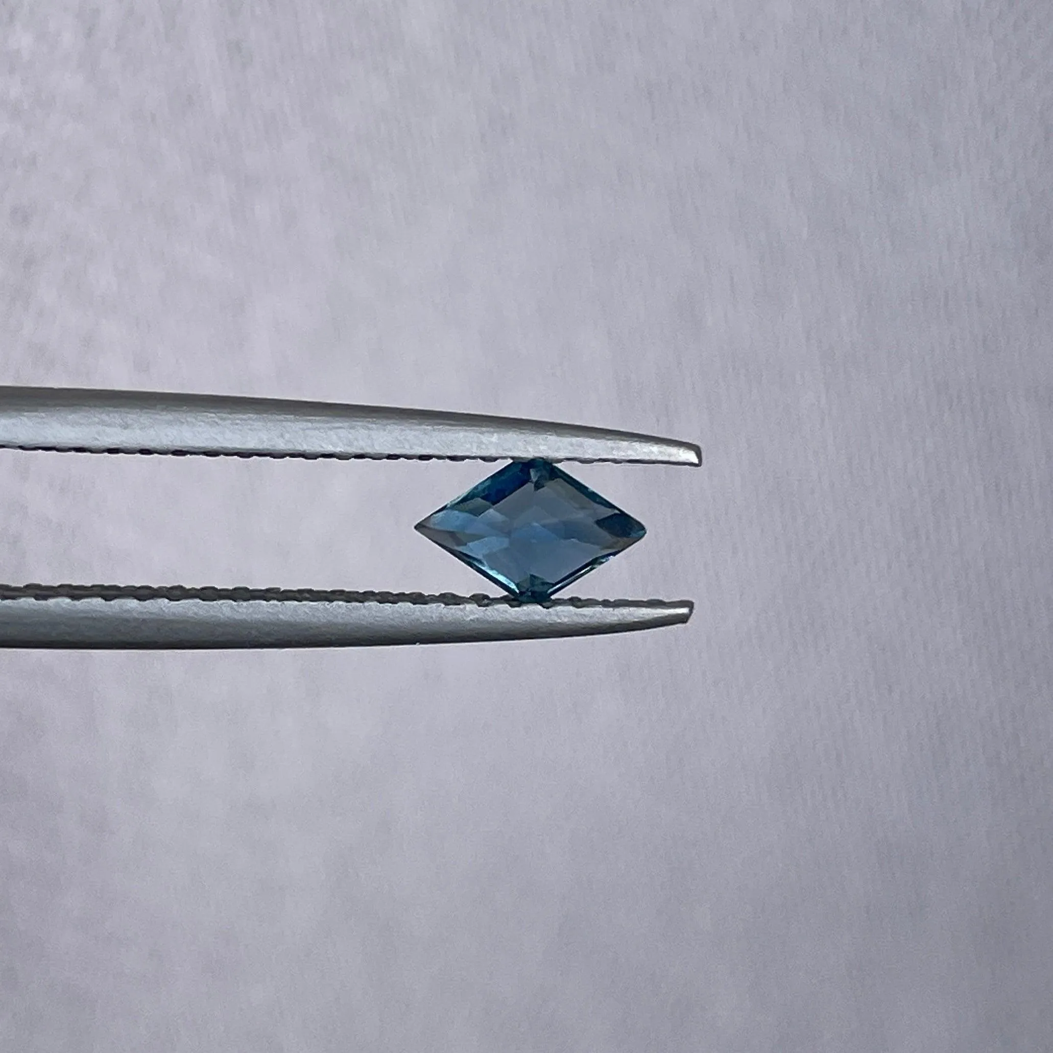 Certified heated Teal Blue kite Cut Sapphire 0.45 Carats 4.00 x 6.10 x 3.30mm