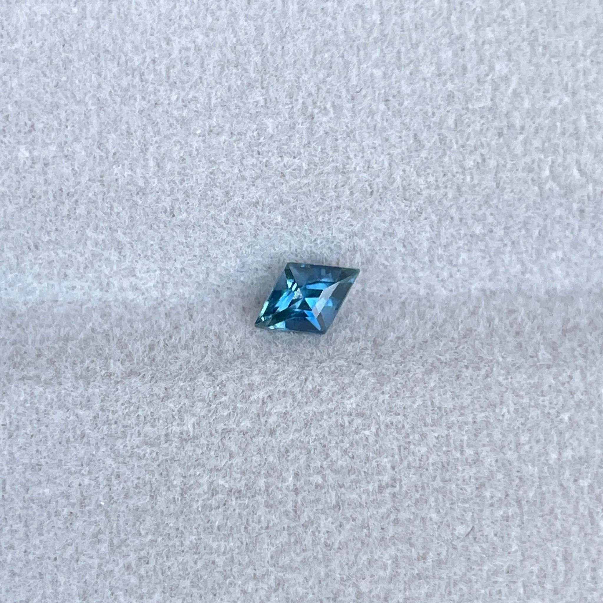 Certified heated Teal Blue kite Cut Sapphire 0.45 Carats 4.00 x 6.10 x 3.30mm