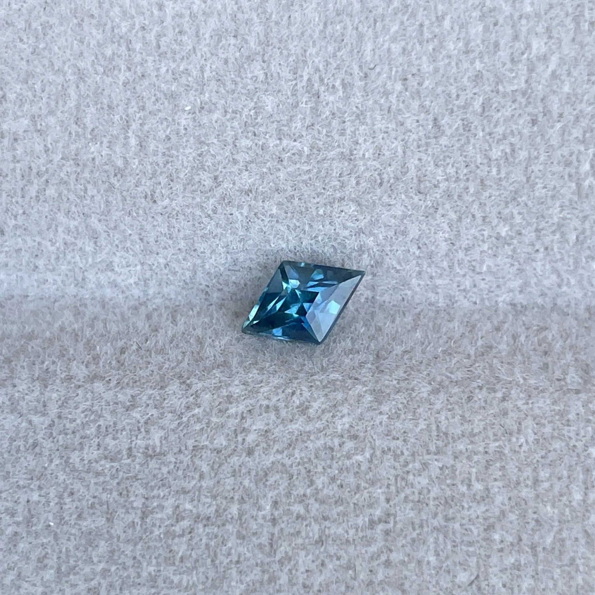 Certified heated Teal Blue kite Cut Sapphire 0.45 Carats 4.00 x 6.10 x 3.30mm