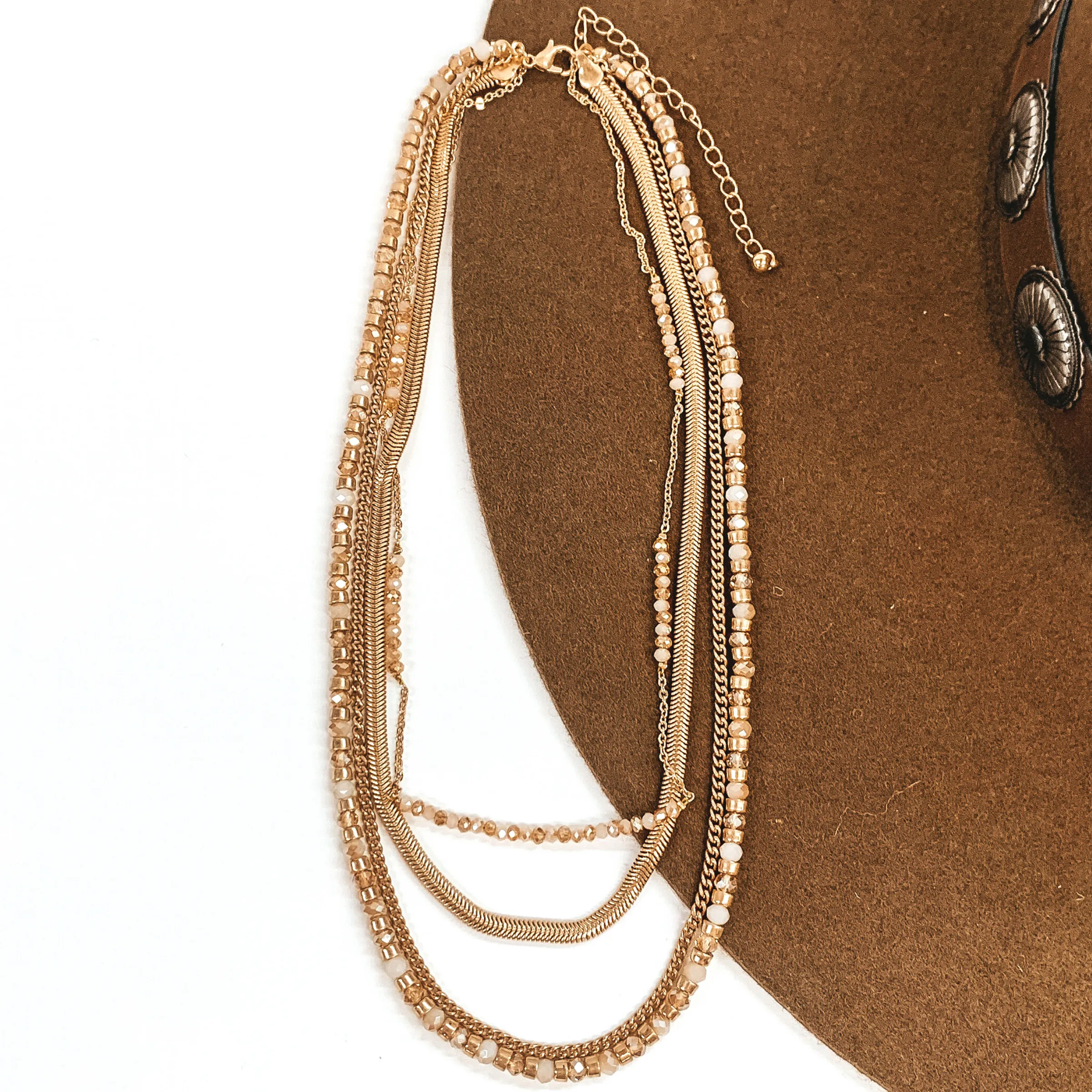 Four Strand Chain and Beaded Necklace in Gold Tone