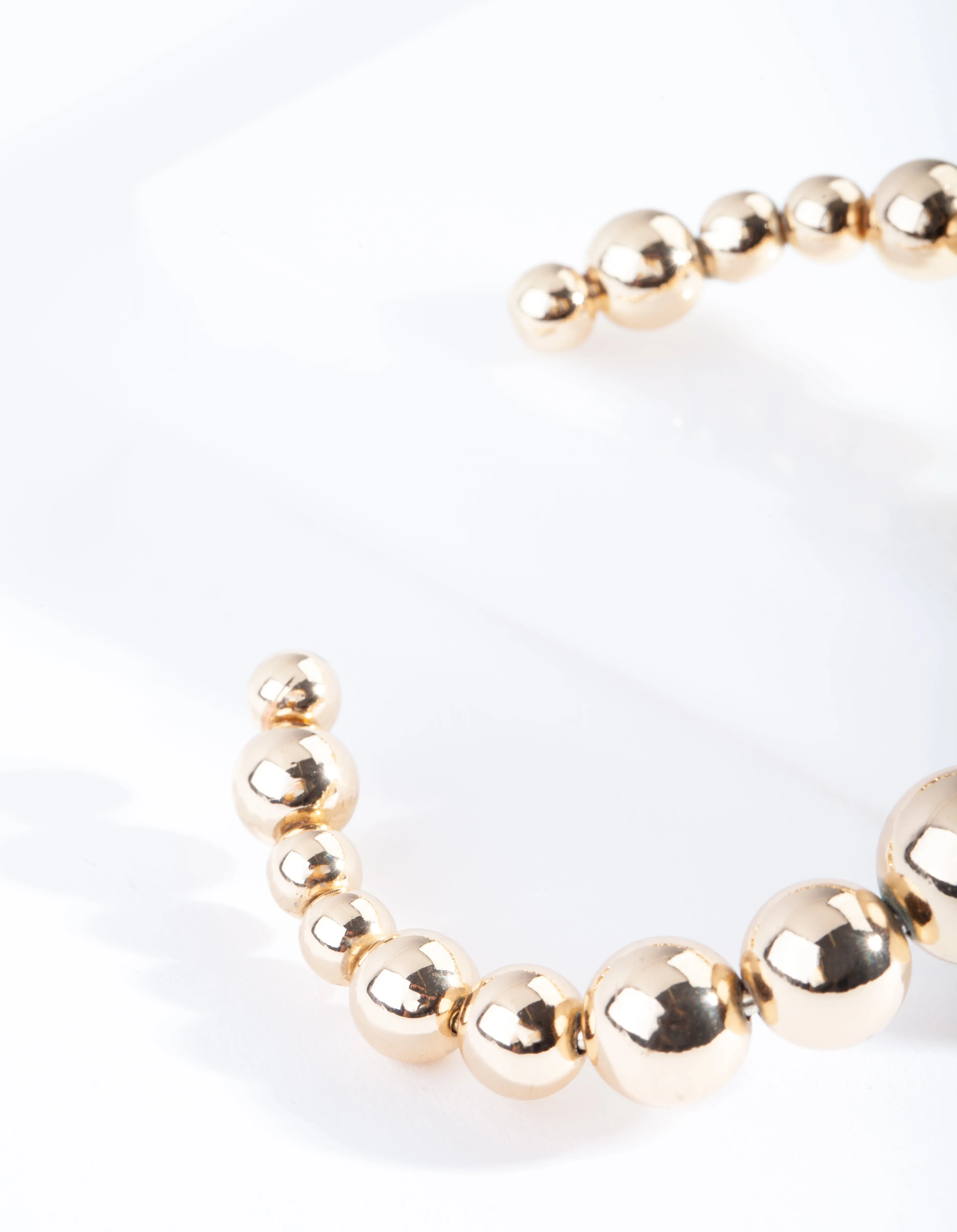 Gold Graduating Ball Cuff Bangle