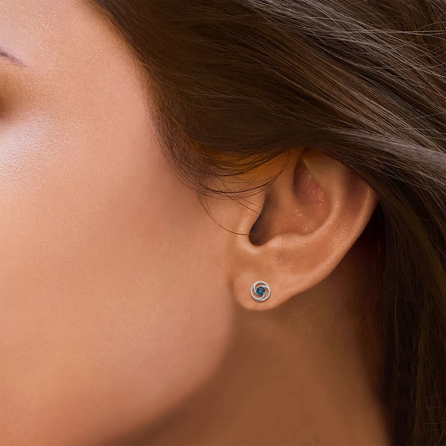 Jewelili Sterling Silver with 1/6 CTTW Natural White Diamonds and Coated Blue Topaz Swirl Stud Earrings