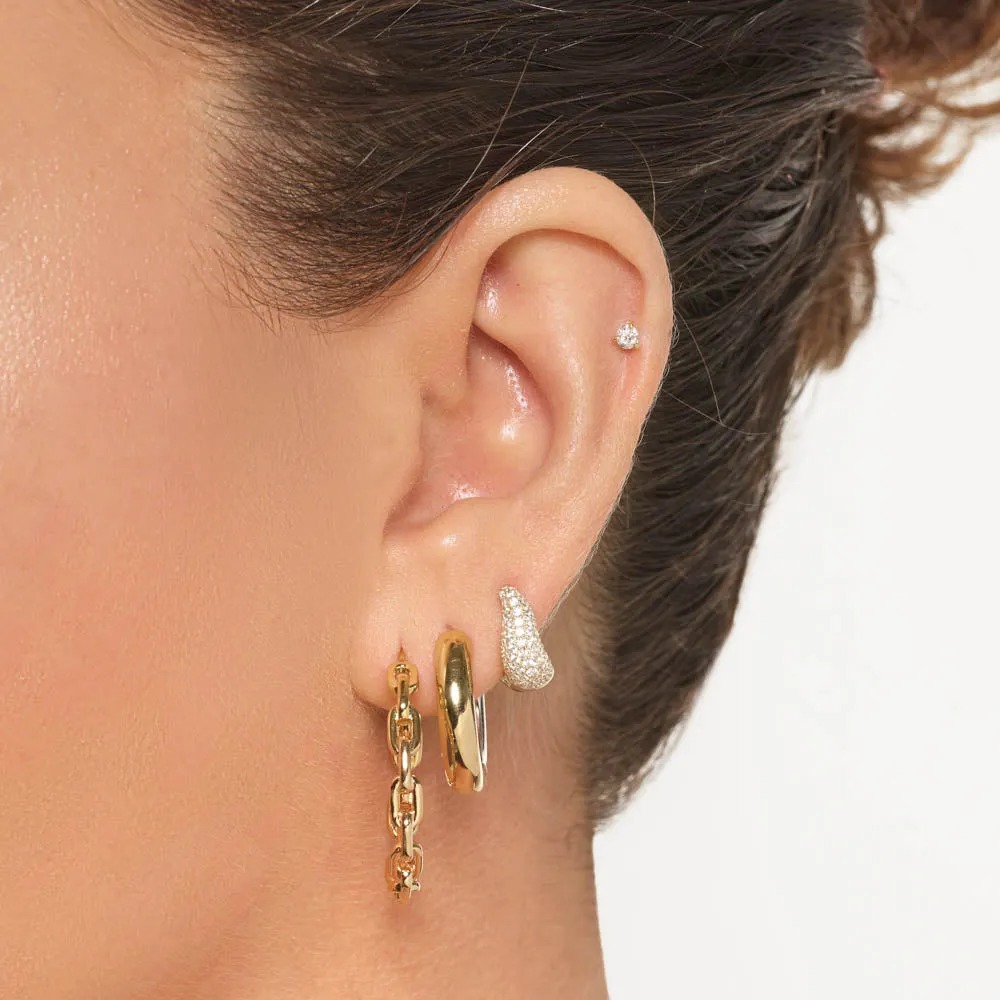 Mini White Topaz Pave Wave Dome Huggies in Gold