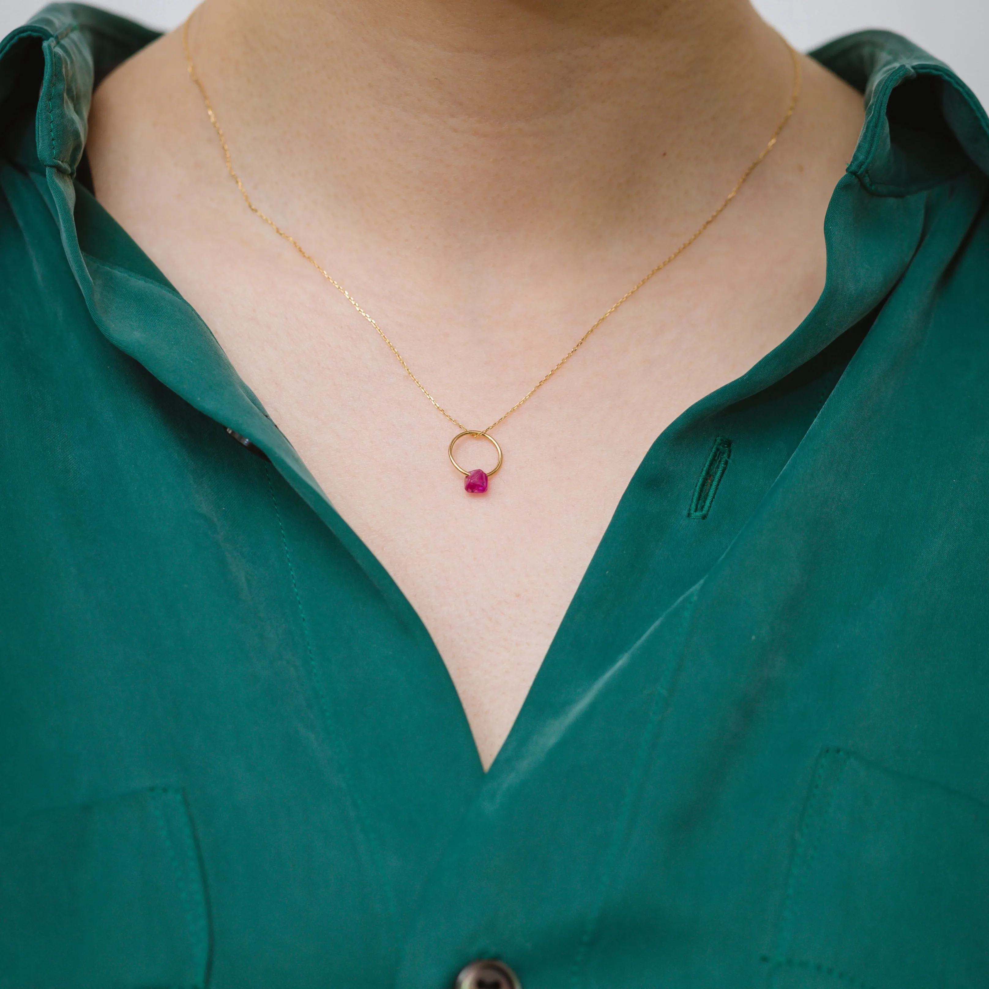 Rough stone ruby pendant