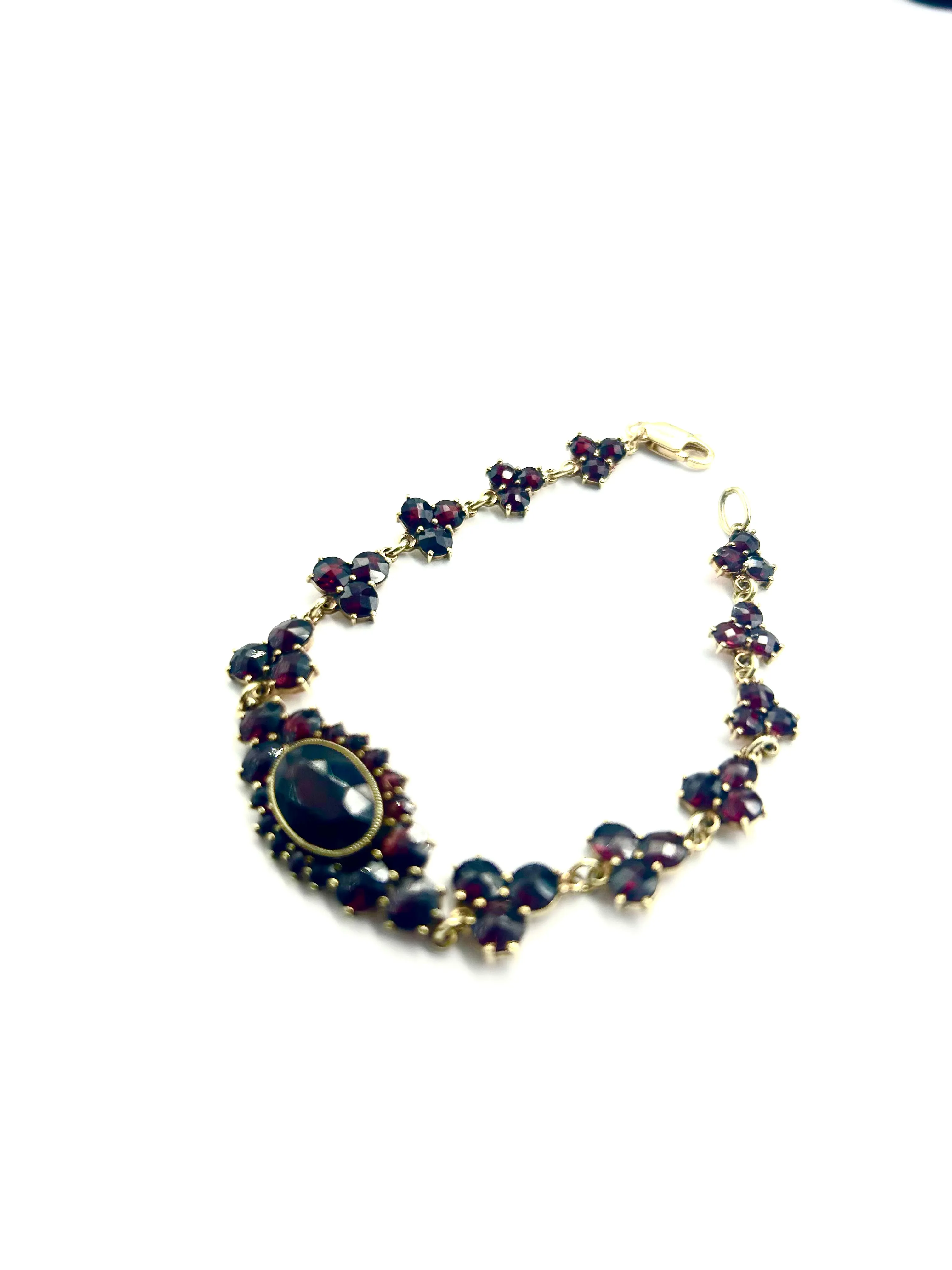 Royalty would love! 14k Yellow Gold and Oval Milange Garnet Bracelet