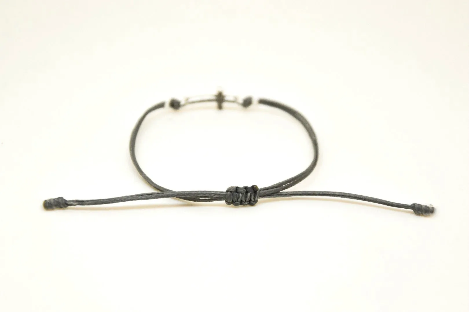 Silver cross charm bracelet, gray cord, adjustable sliding knot, custom color