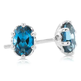 Sterling Silver 6x4mm Oval Cut Blue Topaz  Stud Earrings