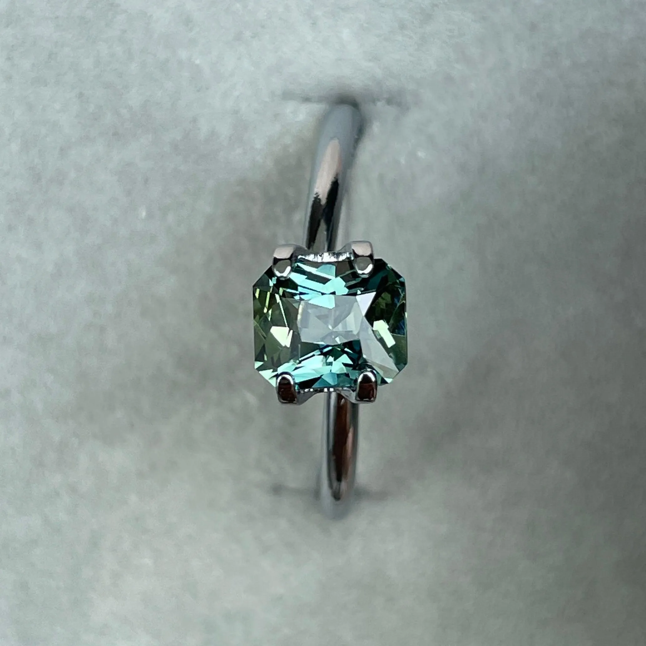 This 1.18 crt Teal Sapphire/ Mermaid sapphire is well cut to bring out the best colour and lustre, and has a perfect colour blend