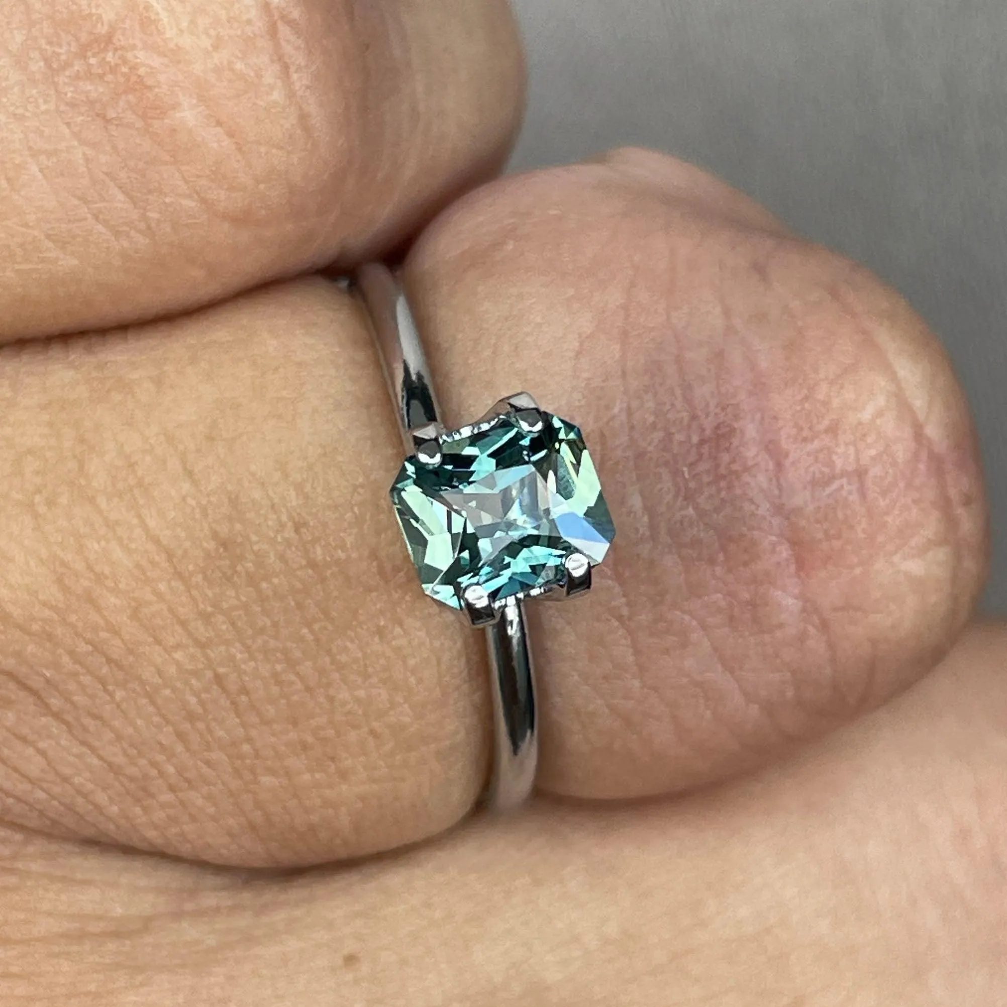 This 1.18 crt Teal Sapphire/ Mermaid sapphire is well cut to bring out the best colour and lustre, and has a perfect colour blend