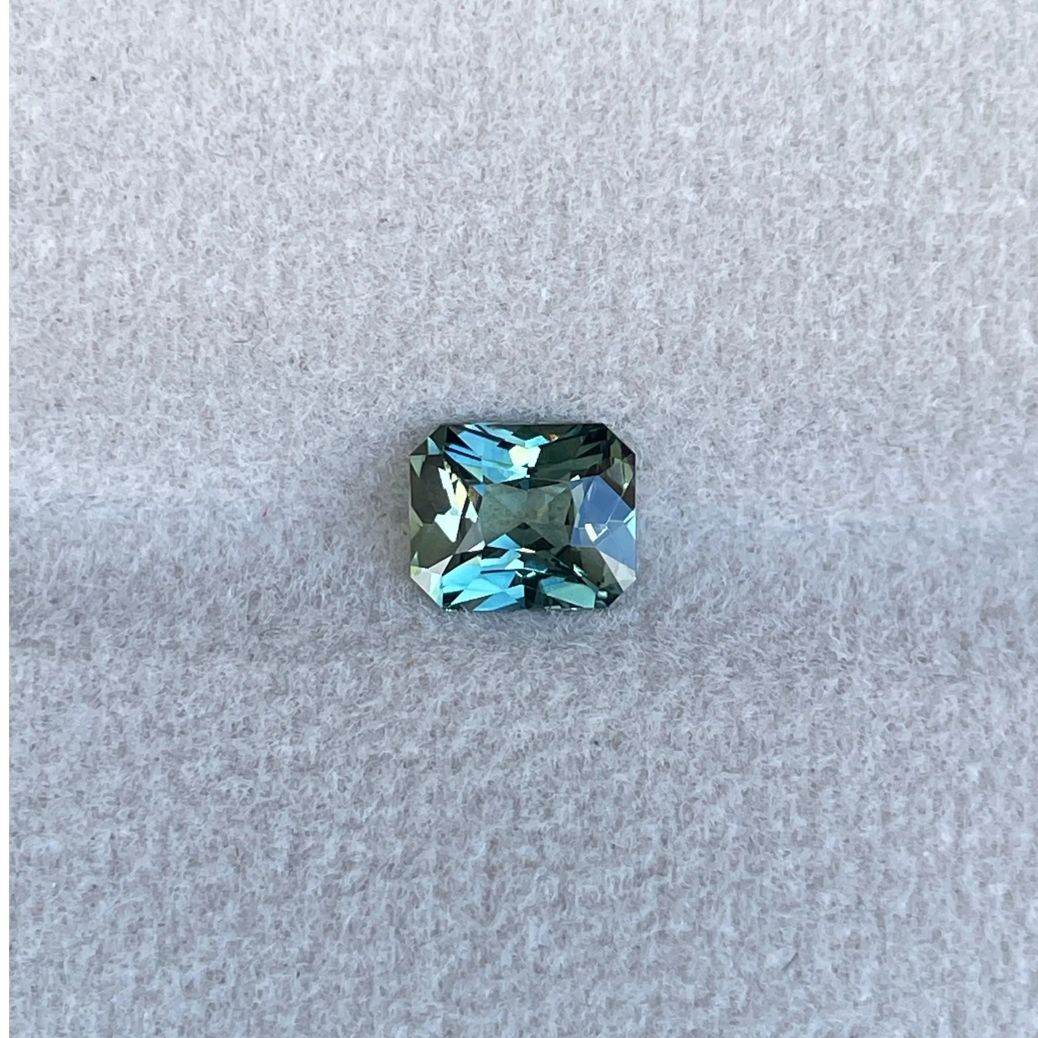 This 1.18 crt Teal Sapphire/ Mermaid sapphire is well cut to bring out the best colour and lustre, and has a perfect colour blend