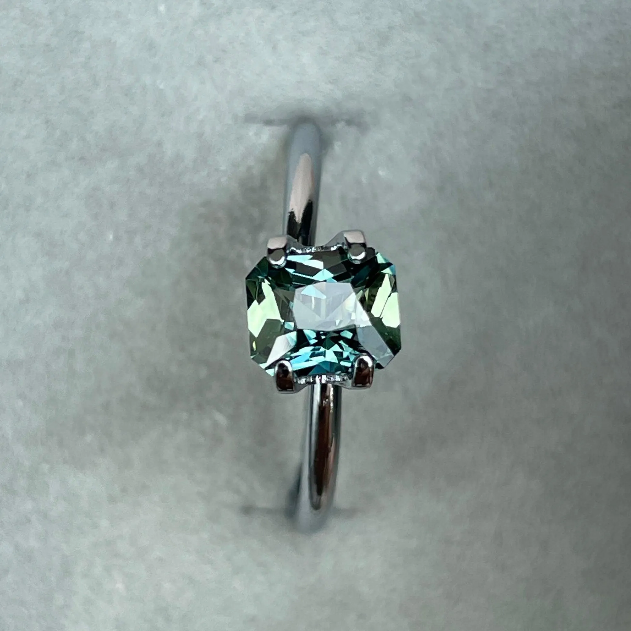 This 1.18 crt Teal Sapphire/ Mermaid sapphire is well cut to bring out the best colour and lustre, and has a perfect colour blend