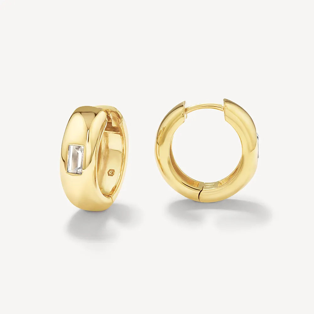 White Topaz Baguette Curve Huggies in Gold