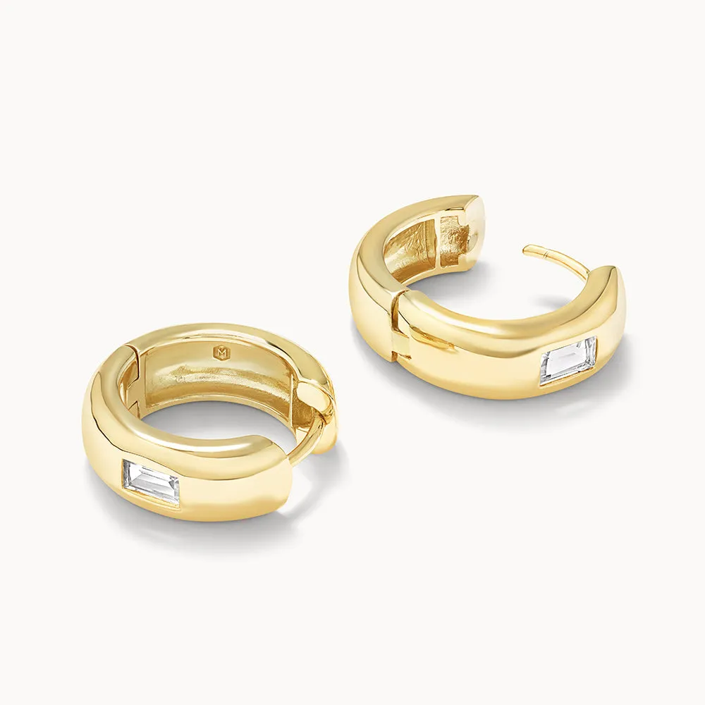 White Topaz Baguette Curve Huggies in Gold