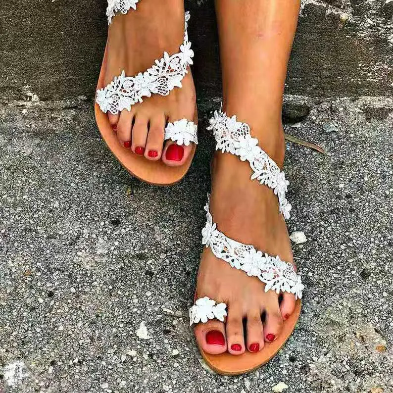 Women ring toe flower strappy slip on flat sandals